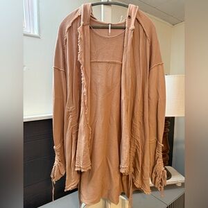 Free People Get Yer Gauze hooded cardigan in a tan/ballet color.